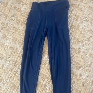 Dark/royal blue jogger pants with pockets. Size M.
